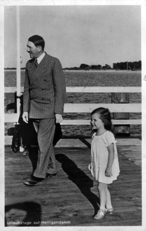 Adolf Hitler with Helga Goebbels during a walk at Heiligendamm